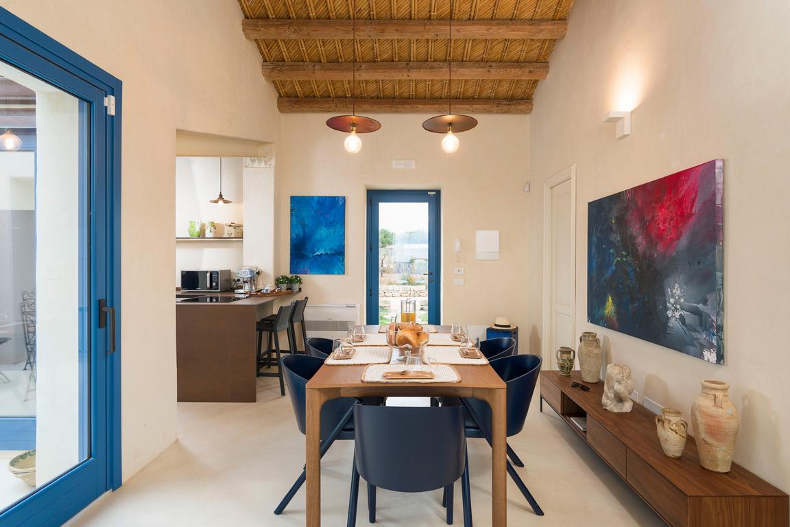 Kitchen with dining table in luxury villa Sicily